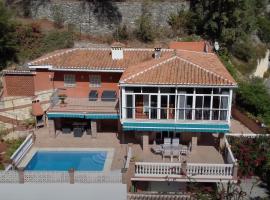 Espectacular casa en la playa con piscina privada, cabaña o casa de campo en Almuñécar