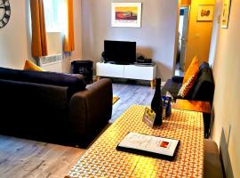 Sunflower Apartment, Family accommodation Near Tenby in Pembrokeshire，滕比的海濱度假屋