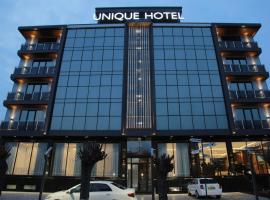 UNIQUE HOTEL, hotel with parking in Chilanzar