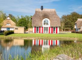 Ferienhaus Schilfrohrsaenger 26, отель в городе Fuhlendorf