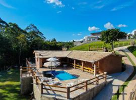 Chácara com piscina aquecida em condomínio fechado, villa a Jarinu