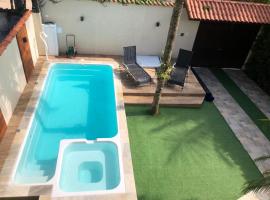 Casa de praia, piscina aquecida, cervejeira e bilhar, hotell sihtkohas Bertioga huviväärsuse Restingas of Bertioga Estadual Park lähedal