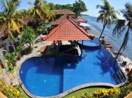 Paradise Palm Beach Bungalows and Dive Center, hotel in Tulamben