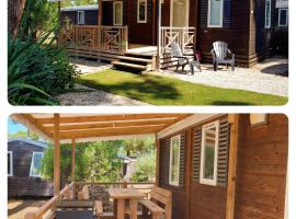 Mobil home Happiness33 dans camping 5 étoiles accès direct plage Vendays Montalivet, hotel en Vendays-Montalivet