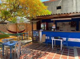 hostal alquimista, hotel en Taganga