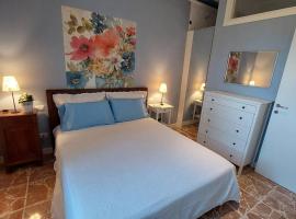 Appartamento - Lì de Là tra i fiori, apartmen di Villafranca di Verona