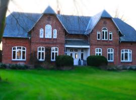 Ferienwohnung Landhaus, בית כפרי בMaasbüll