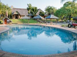 Aan De Vliet Holiday Resort, cabin in Hazyview