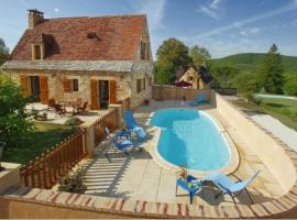 Villa en pierre 4 pers avec Piscine, hotel in Coly