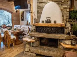 Baśniowy Domek Groń z Jaskinią SPA - Osada Jaworzyny