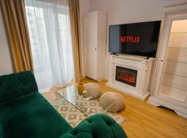 Central cozy 1BR with nice views + Netflix, מלון ליד פארק קרקס המדינה, בוקרשט