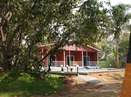 The Mango Leaf Homestay, семеен хотел в Алибаг