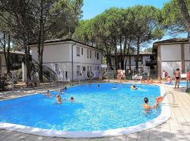 Green Holiday Village with Pool, cabaña o casa de campo en Bibione