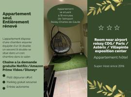 Appartement cosy proche Roissy CDG Astérix DisneyLand Paris, hotel na may parking sa Goussainville