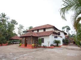 Sardar Bahadur's Heritage Bungalow Estate Stay, hotel in Napoklu