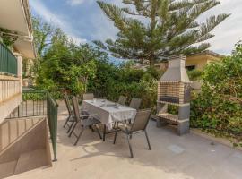 Villa con jardin cerca de la playa, hôtel à Muro