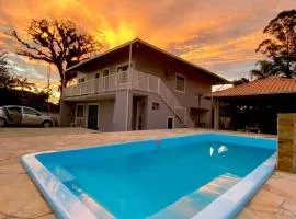 Apartamento em chácara com piscina próximo de praias com internet