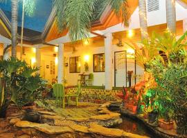 RedDoorz @ Infinite Green Pension Palawan, отель в Пуэрто-Принсеса