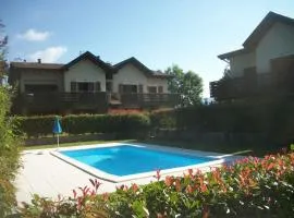 Incantevole appartamento con piscina e vista monti
