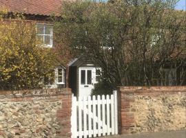 Lovely 3-Bed Cottage in Brancaster Staithe, хотел в Бранкастър