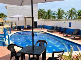 Cabañas Familiares en Coveñas con Piscina frente a la Playa, hotel v destinaci Nicomar