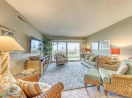 Island-themed living with furnished patio, shared pool & beach access