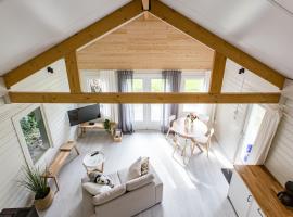 Chalet met loft - vakantiepark de Schreiershoek, cottage in Dokkum