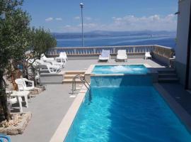 Apartments Mlad - with pool, apartment in Rogač