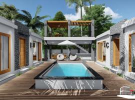 Moringa Resort with Pool, open Air Shower & shared Bath sleeps 8、ウィレムスタッドのプール付きホテル