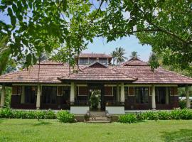 Madilina Homestay, lavprishotell i North Paravur