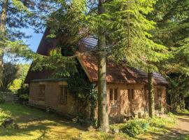 Warmiński dom nad jeziorem, semesterboende i Łomy