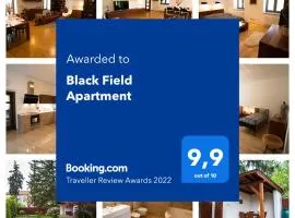 Black Field Apartment
