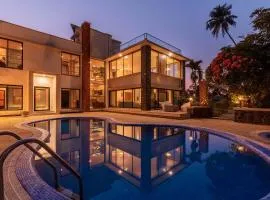 Our Beloved Summer by StayVista - Offering a swimming pool, expansive lawn, badminton court and indoor games