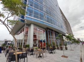 Distrito 90 - Estudios y Apartamentos para vacaciones y viajes de negocio, hótel með jacuzzi-potti í Barranquilla