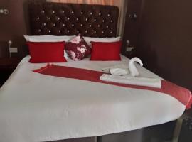 Impovu Guest House, hotel i Kasane