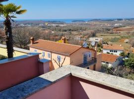 Apartment Nikola for 4 Persons in Mugeba country side with sea view, hotell i Mugeba