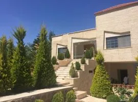 4 bedrooms house with city view balcony and wifi at Amman