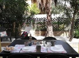 APPARTAMENTO CORALLO with PRIVATE GARDEN, hotel en Olbia