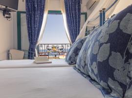 Dionysos Hotel, hotell i Skala