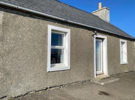 2 Bedroom house overlooking Pierowall Bay, Westray, hotel with parking in Pierowall