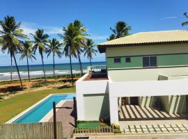 Beach house - secured, beach access, sea view, best location, hotel with parking in Baixio