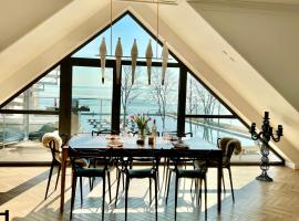 Apartament Masuria Sky w Nautica Resort z widokiem na jezioro Niegocin，位于吉日茨科的酒店