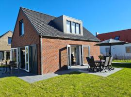 Bungalow 69 op Recreatiepark De Wielen, hotel in Sint Maarten