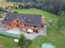 Olza Karczma i pokoje – hotel w pobliżu miejsca Wyciąg narciarski Kaimówka w Istebnej