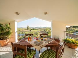 EUCALIPTO, splendido con terrazza panoramica sulla campagna versiliese, διαμέρισμα σε Massarosa