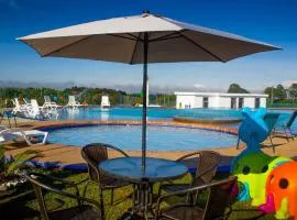 Apartamento con piscina a 5 minutos del parque del café
