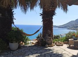 Elouthia Residence with Sea View and Hot Tub, hotel with parking in Tsoútsouros