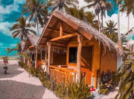 Zhaya's Beach & Cottages, posada u hostería en El Nido