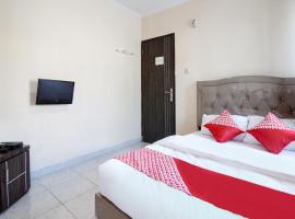 OYO 91065 Guest House 19 Syariah, hotell sihtkohas Palas 2