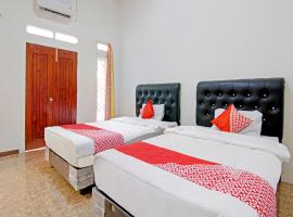 OYO 91093 Guest House 513 Syariah, hotel in Pekanbaru